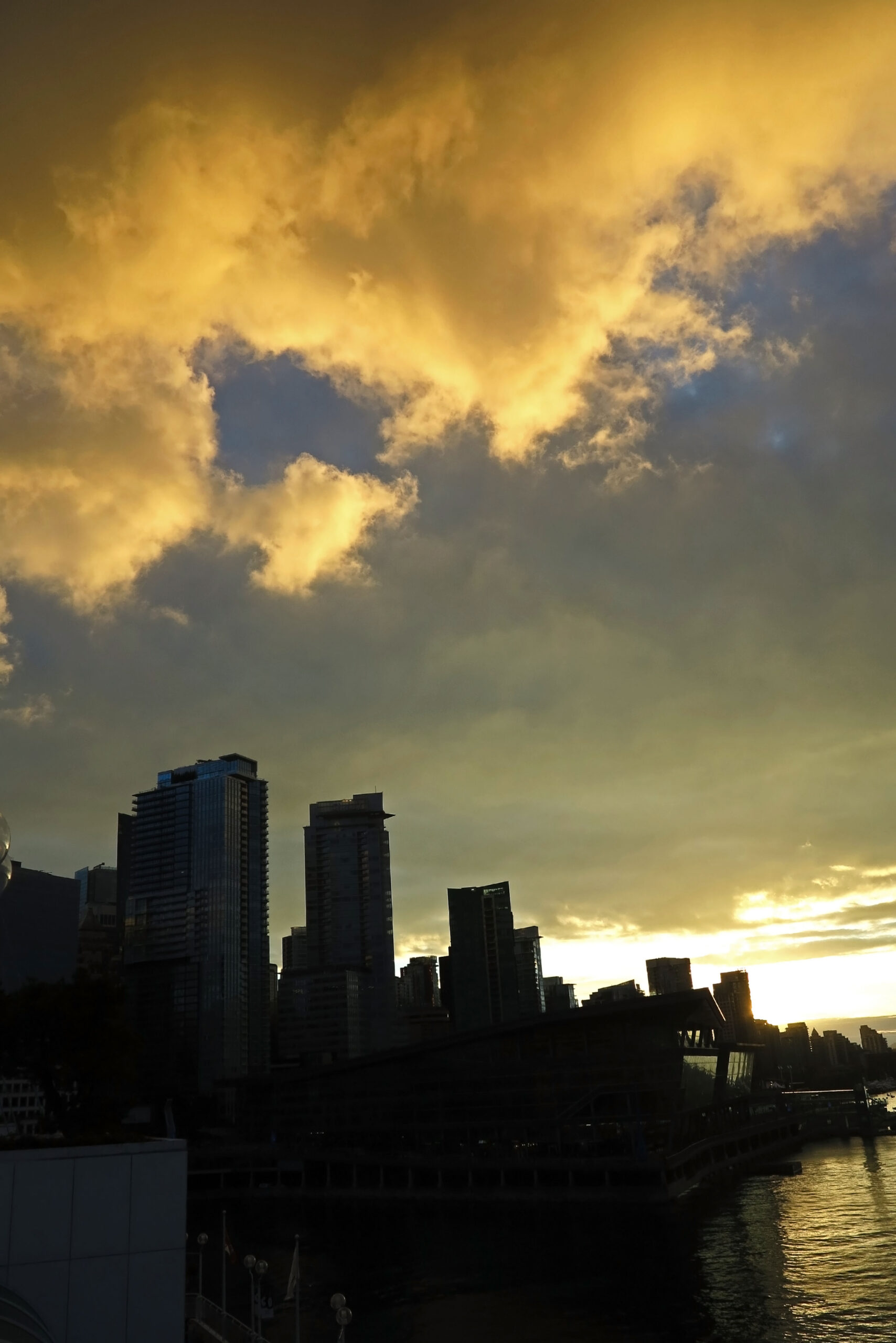 Golden light over the Vancouver skyline viewed from Canada Place
